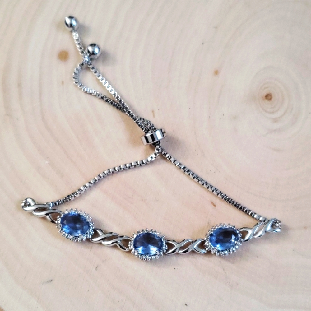 Silver-Tone Bolo Bracelet with Tanzanite-Colored Stones – Adjustable & Elegant